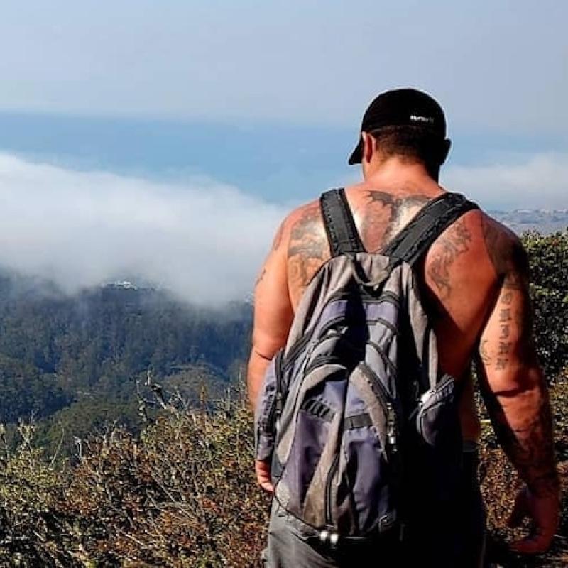 Colby embarking on an hike