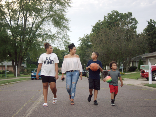 Jessica taking a walk with her children