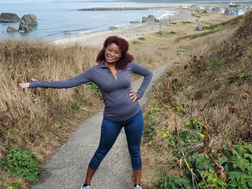 Eva posing for a photo on jogging path